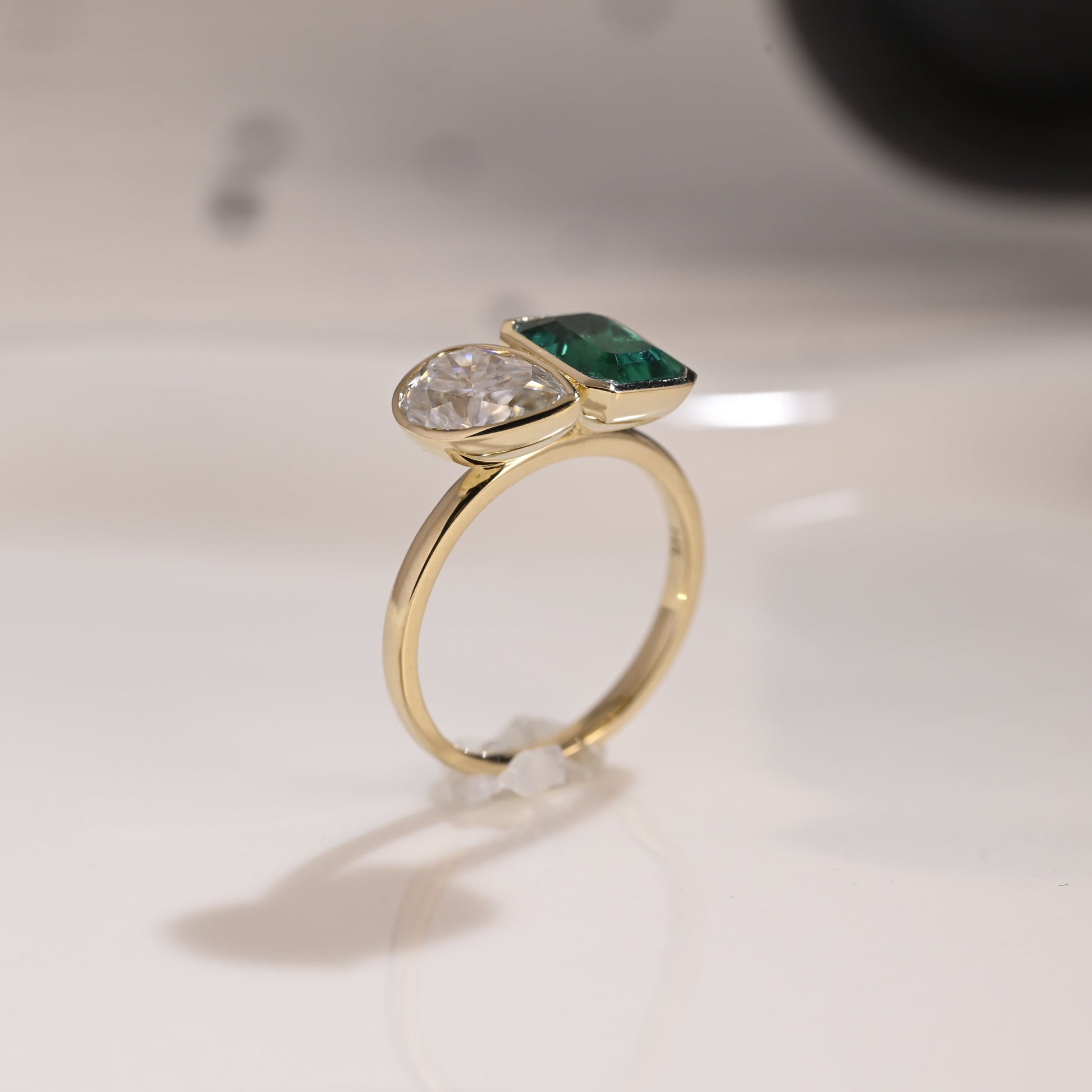 Solid Gold Bezel Toi et Moi Lab Emerald & Pear Cut Moissanite Engagement Ring