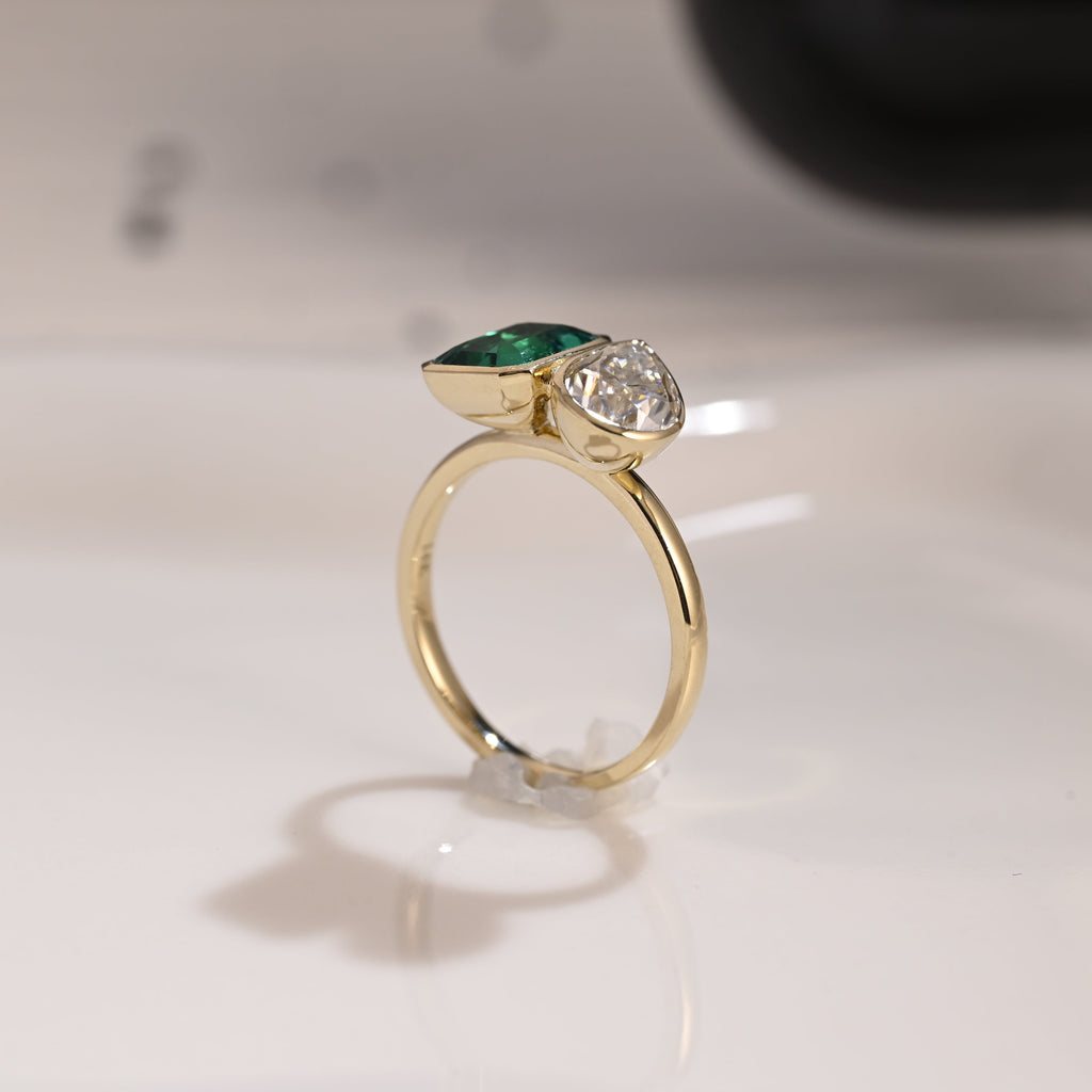 Solid Gold Bezel Toi et Moi Lab Emerald & Pear Cut Moissanite Engagement Ring