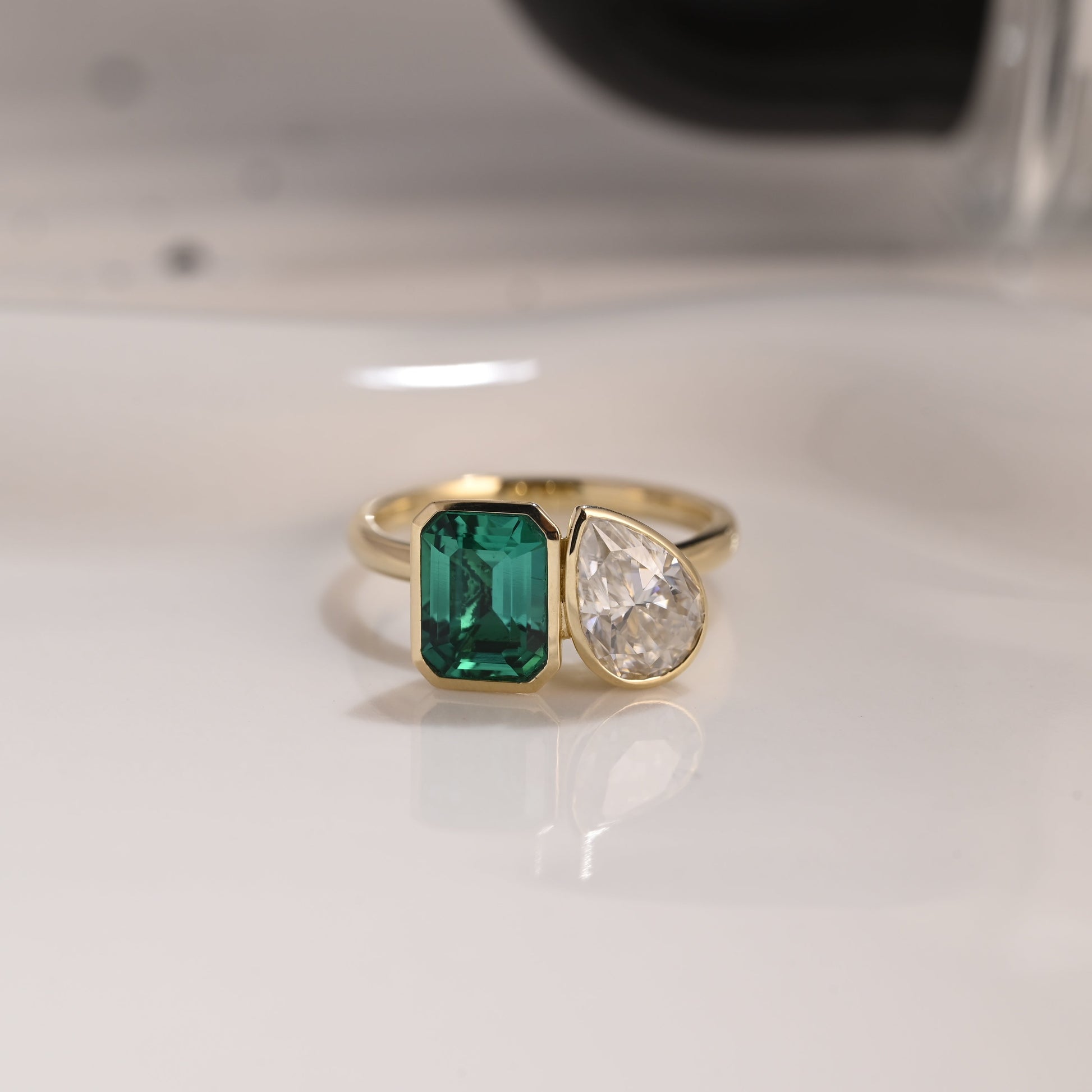 Solid Gold Bezel Toi et Moi Lab Emerald & Pear Cut Moissanite Engagement Ring
