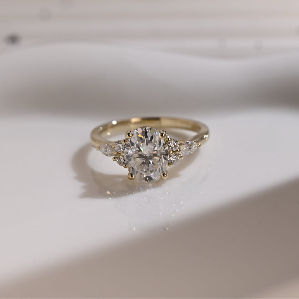 Solid Gold Side Cluster Oval Cut Moissanite Engagement Ring