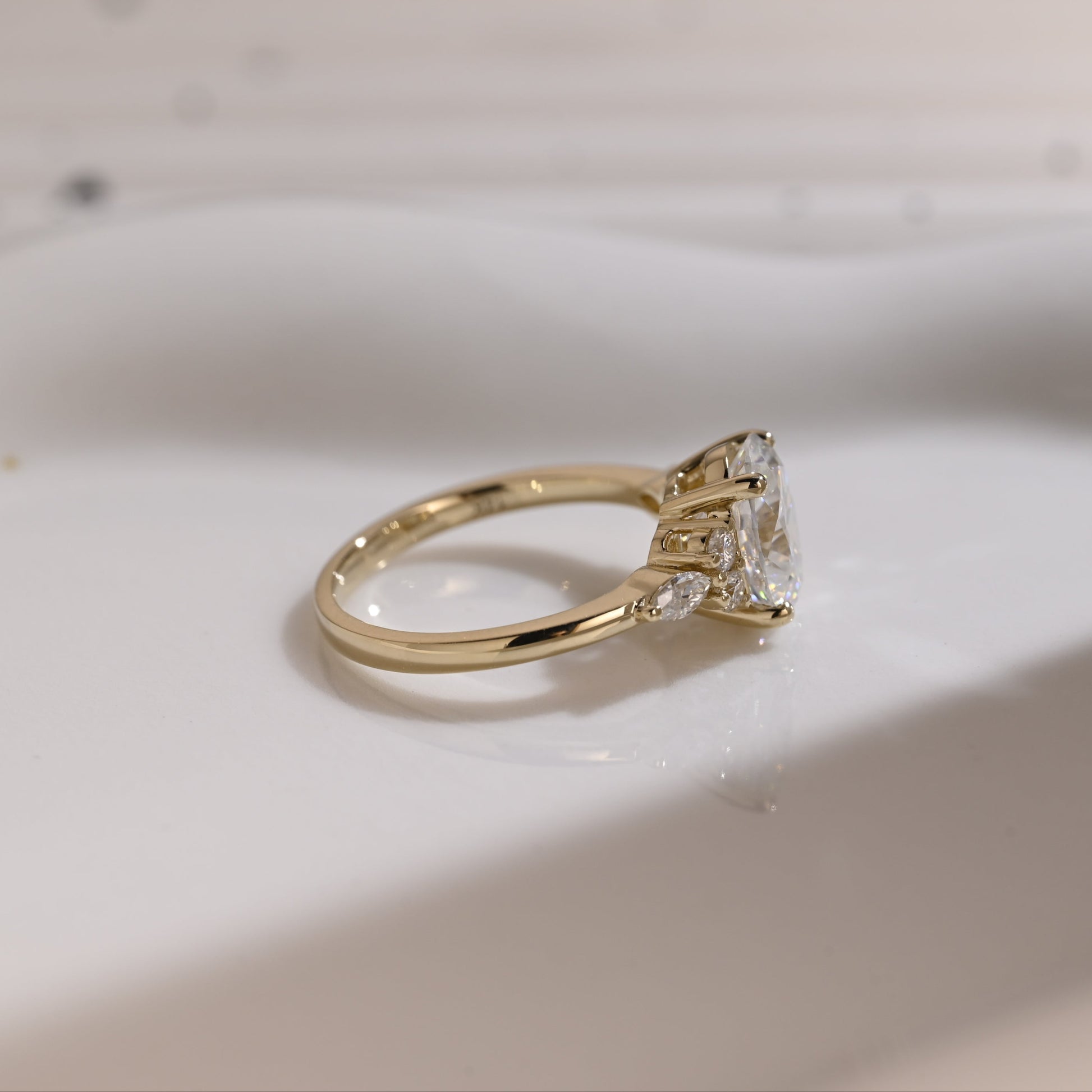Solid Gold Side Cluster Oval Cut Moissanite Engagement Ring