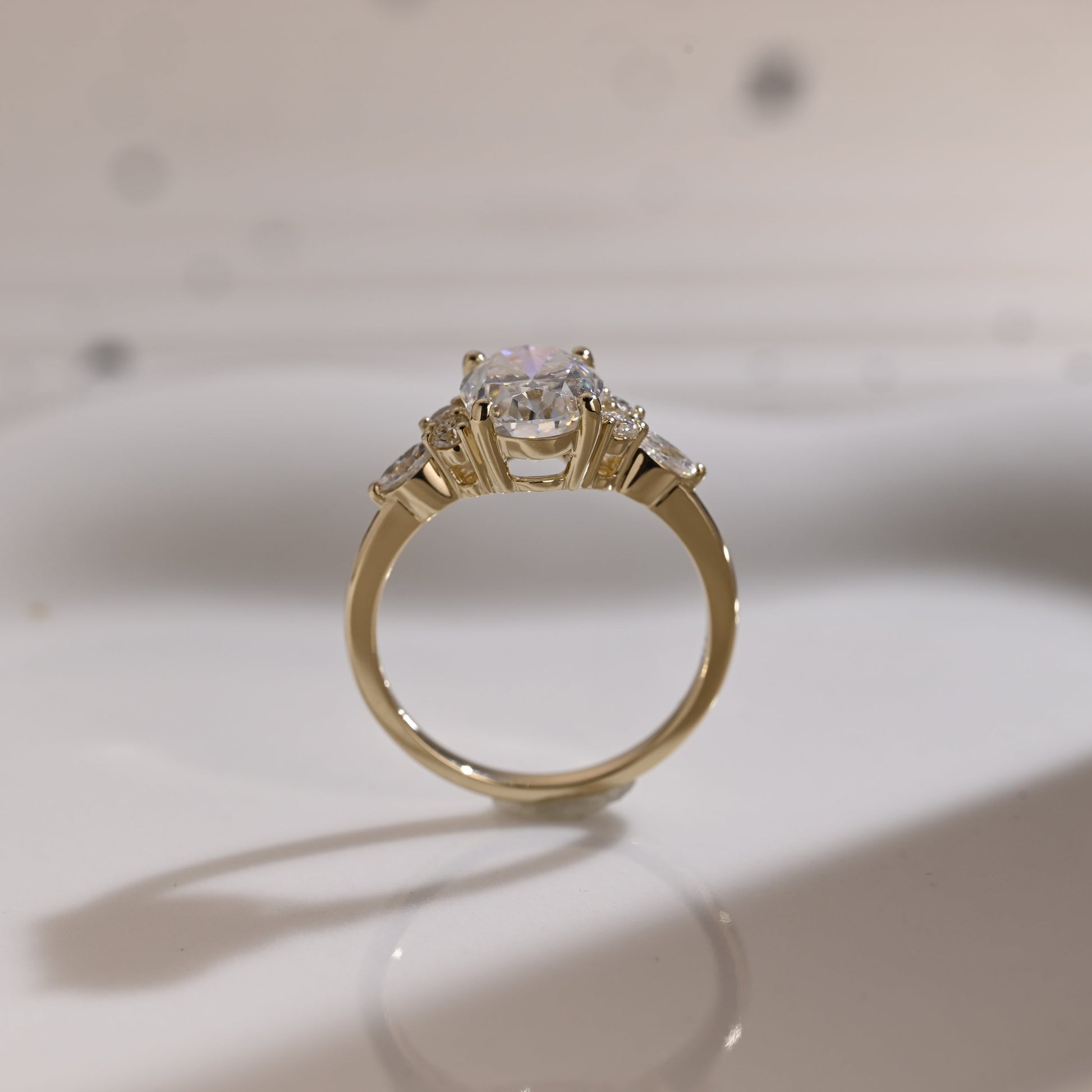 Solid Gold Side Cluster Oval Cut Moissanite Engagement Ring