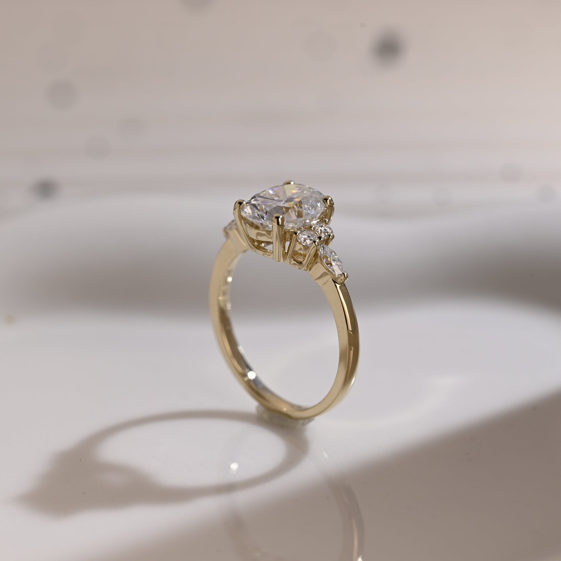 Solid Gold Side Cluster Oval Cut Moissanite Engagement Ring