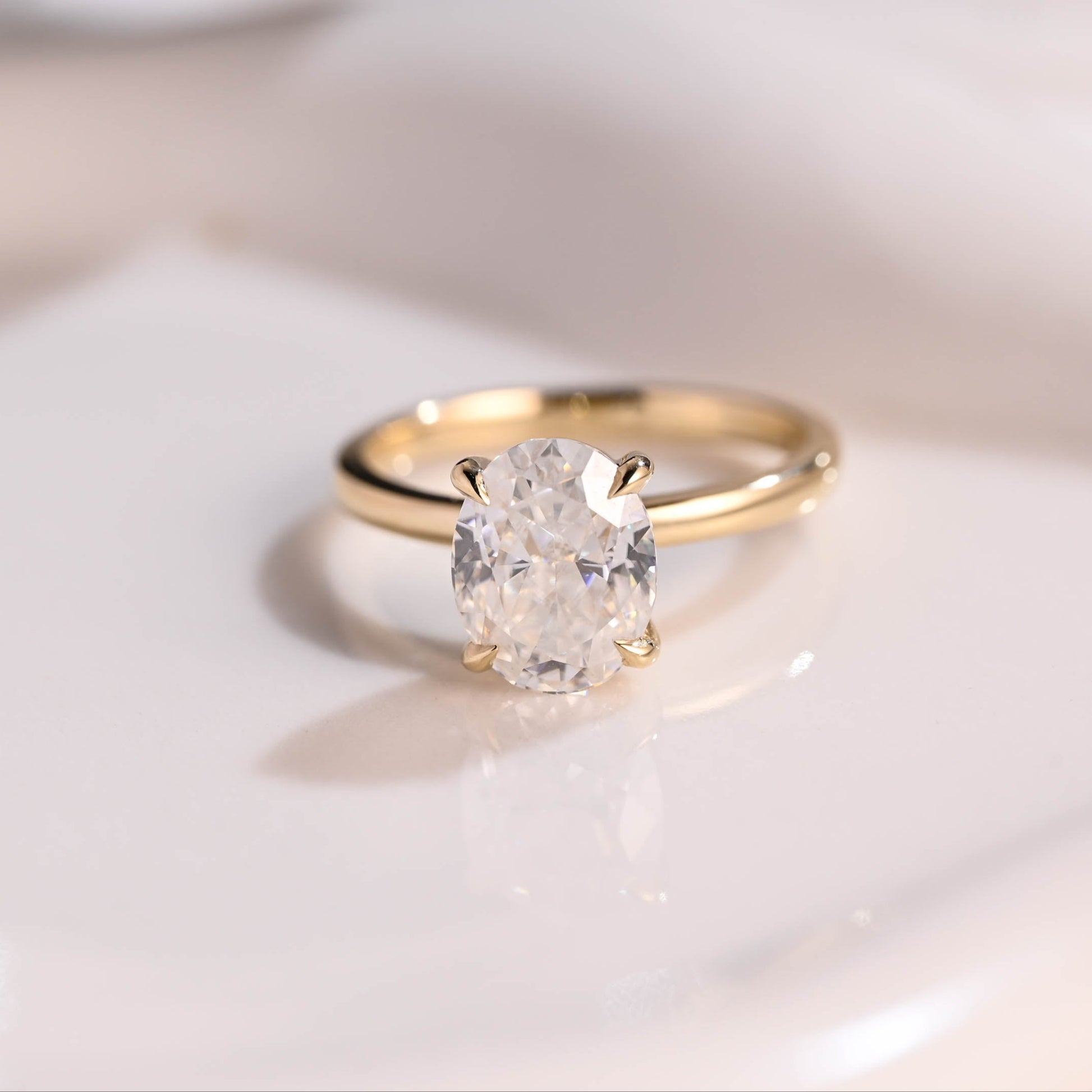 Solid Gold Solitaire Crushed Ice Oval Cut Moissanite Engagement Ring