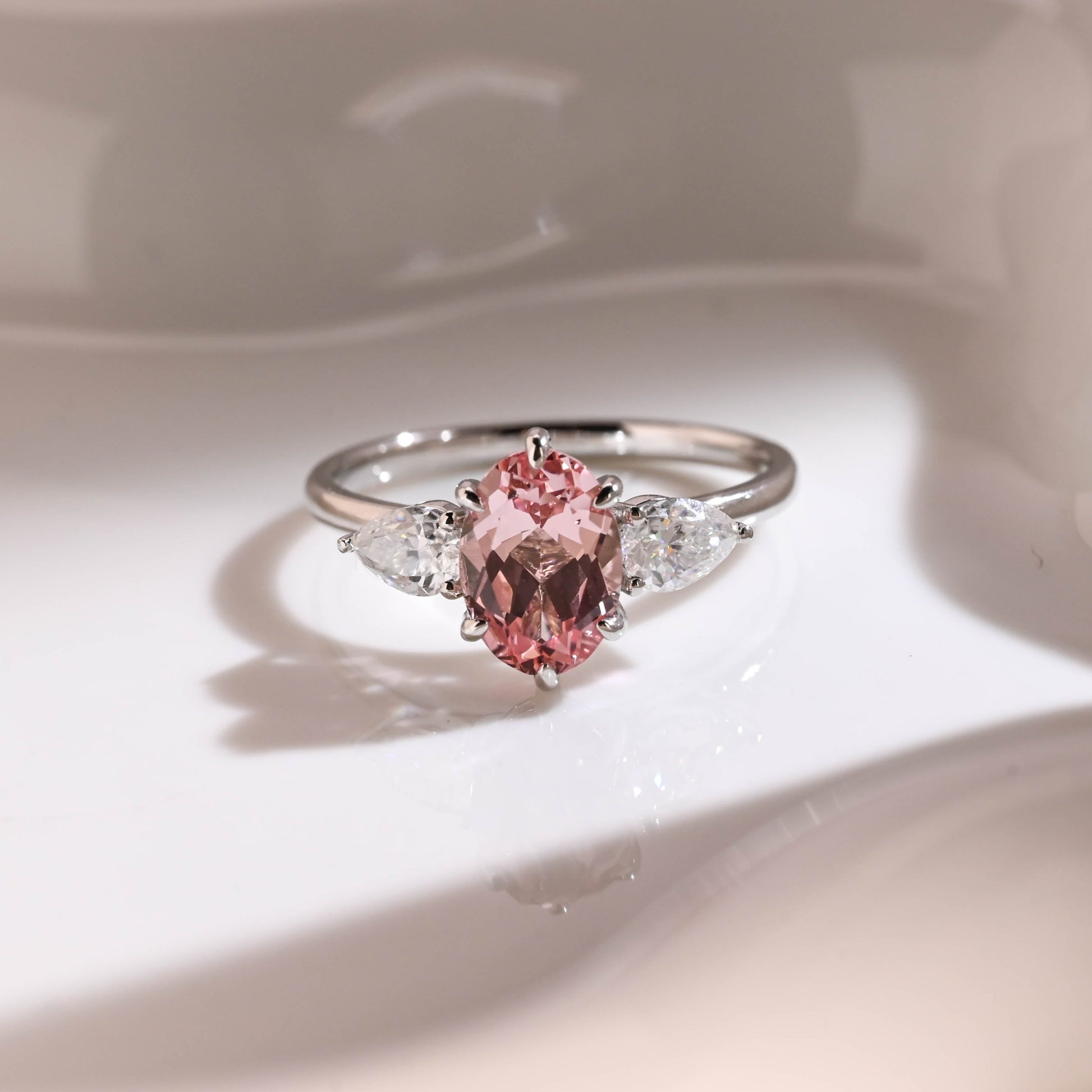 Three Stone Oval Cut Pink Sapphire Engagement Ring