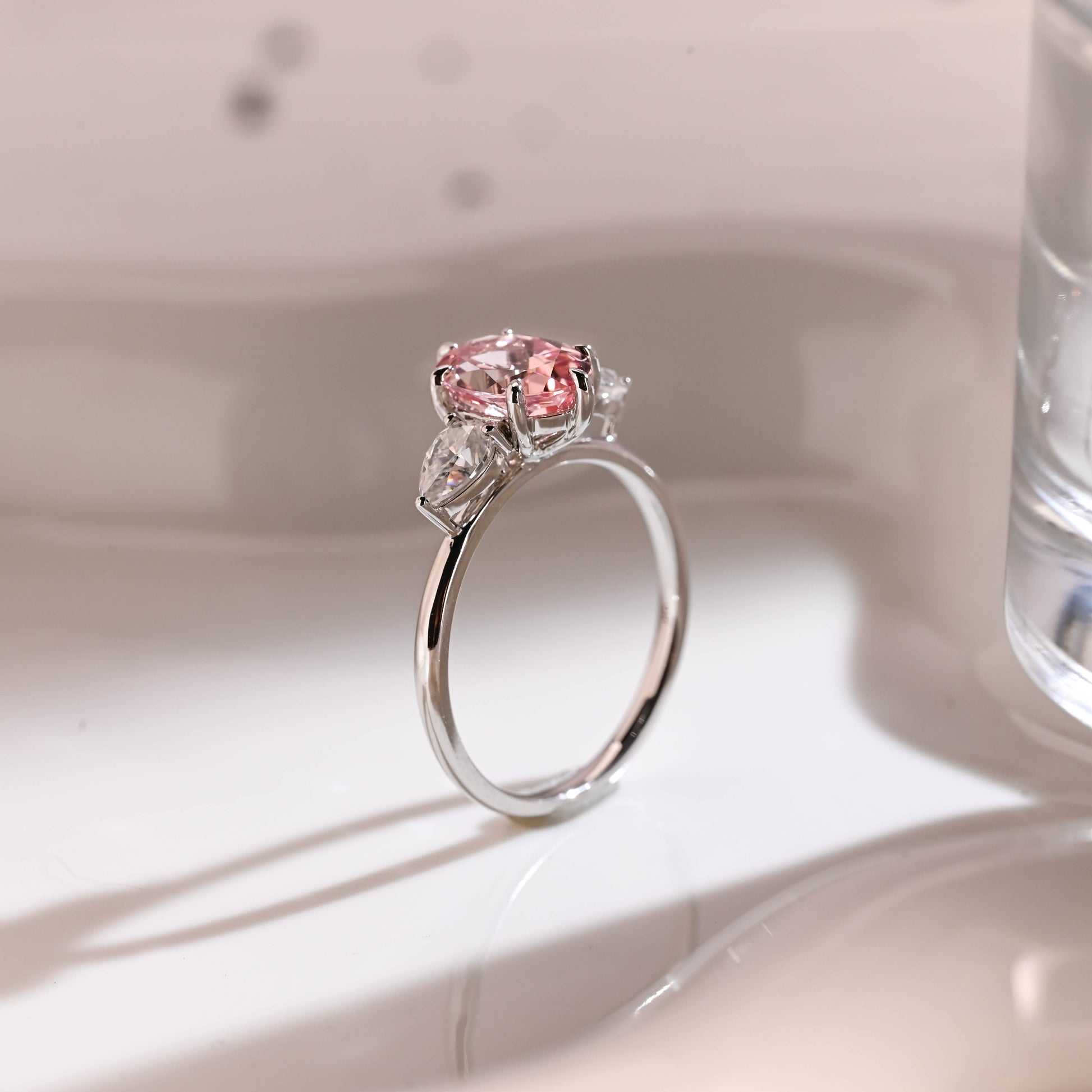 Three Stone Oval Cut Pink Sapphire Engagement Ring