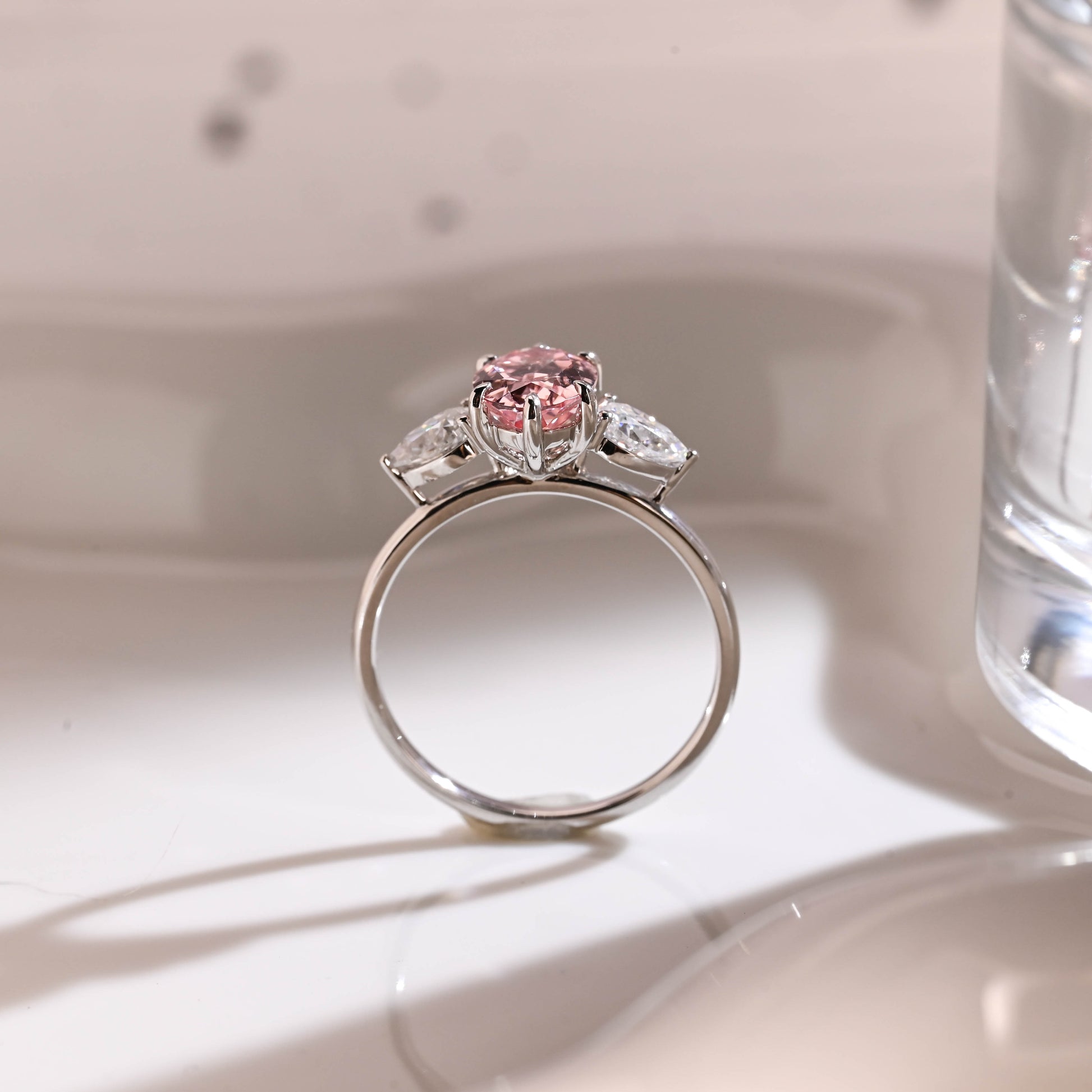 Three Stone Oval Cut Pink Sapphire Engagement Ring