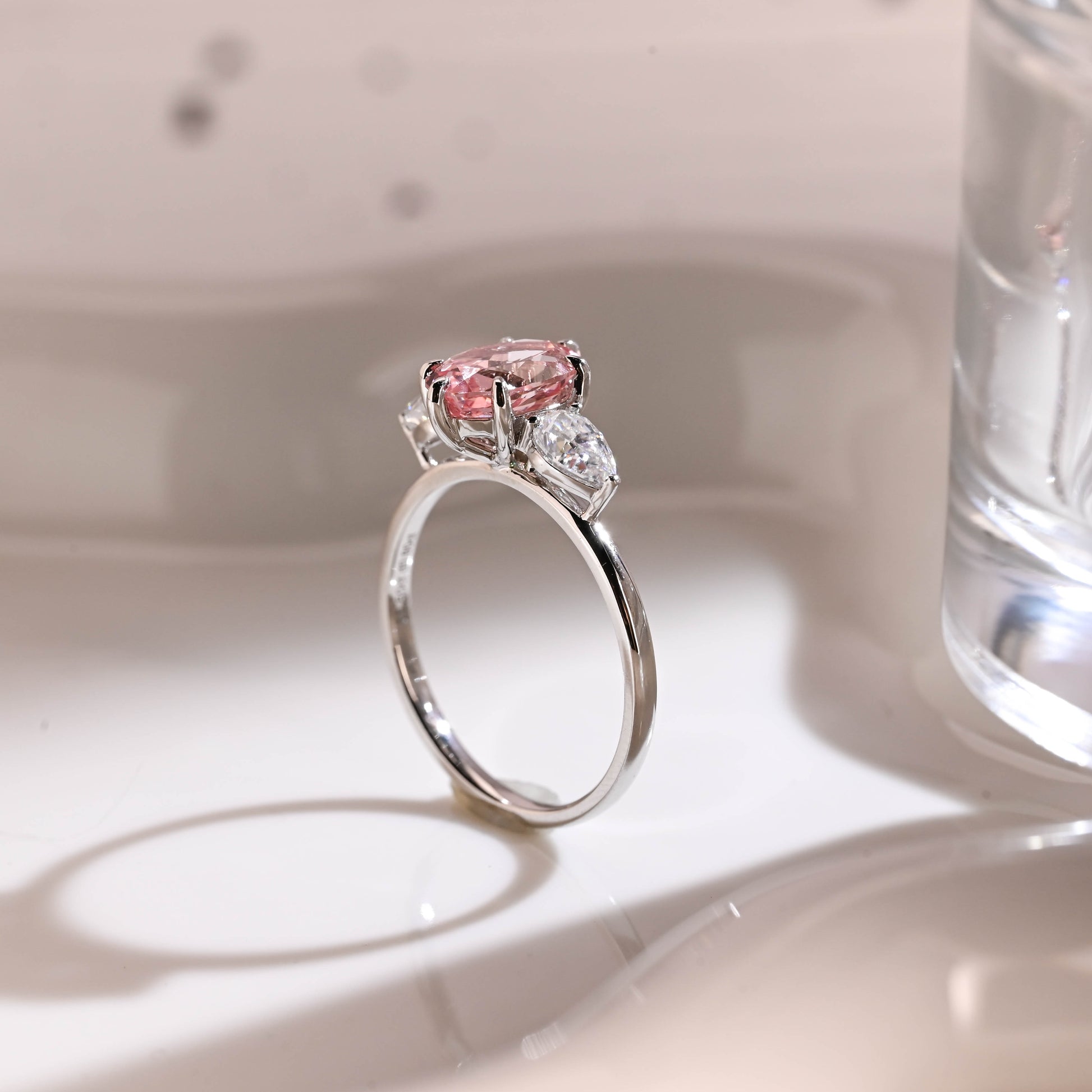 Three Stone Oval Cut Pink Sapphire Engagement Ring