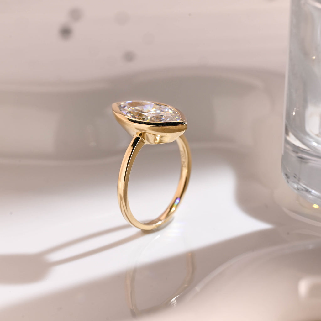 Solid Gold Solitaire Crushed Ice Marquise Cut Moissanite Engagement Ring