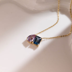 Solid Gold Emerald Cut Blue Topaz & Pear Cut Alexandrite Pendant Necklace