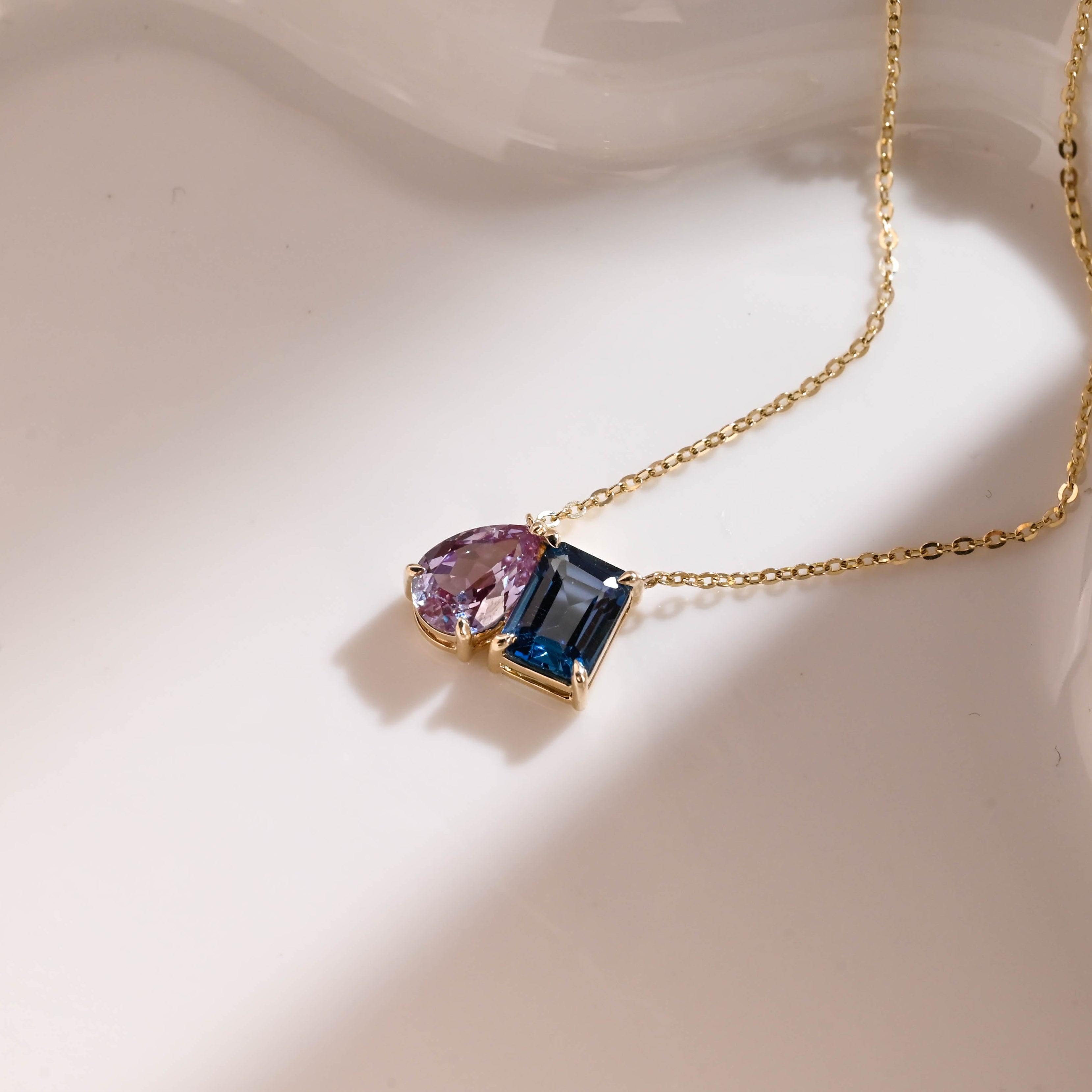 Solid Gold Emerald Cut Blue Topaz & Pear Cut Alexandrite Pendant Necklace