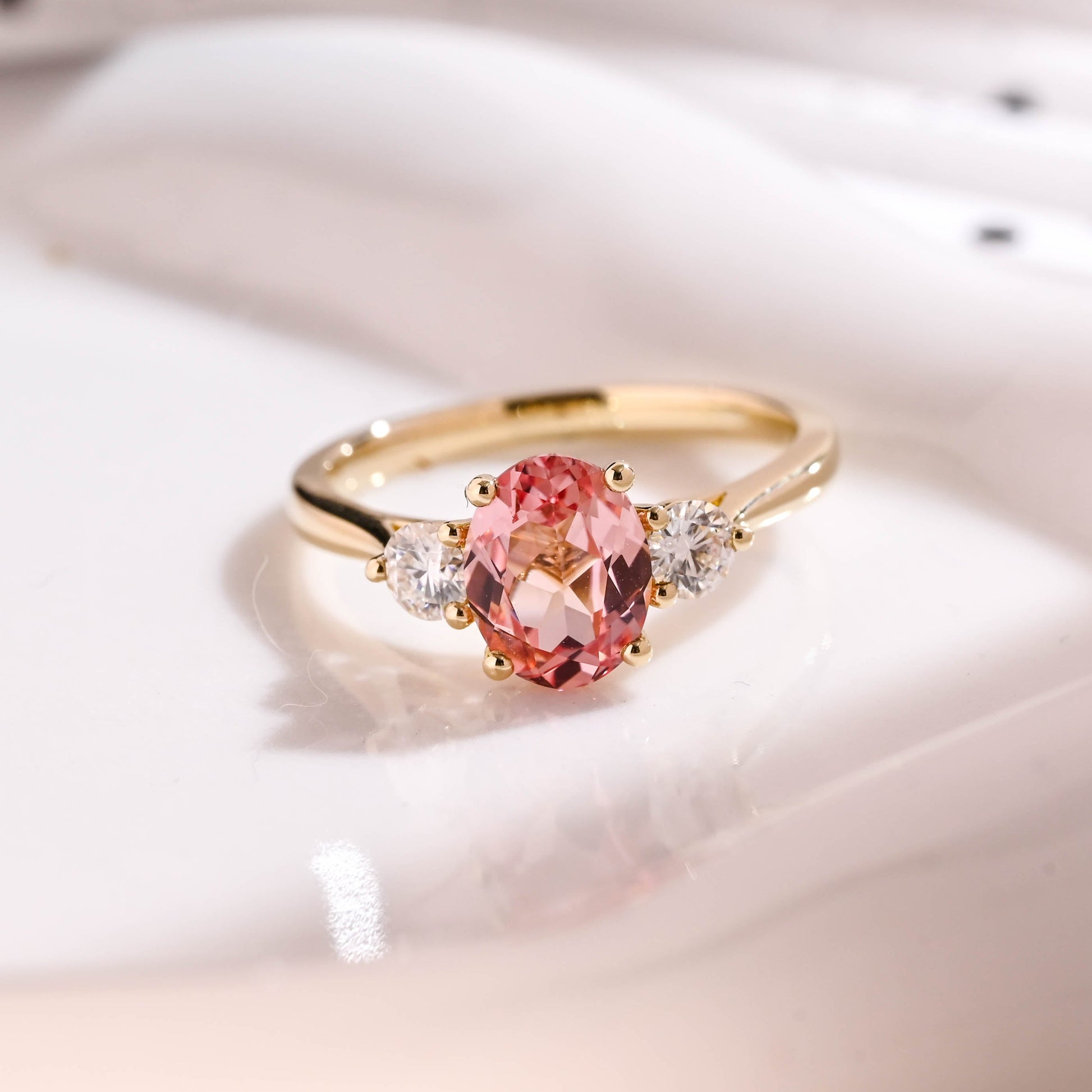 Solid Gold Three Stone Oval Cut Pink Lab Grown Sapphire Engagement Ring