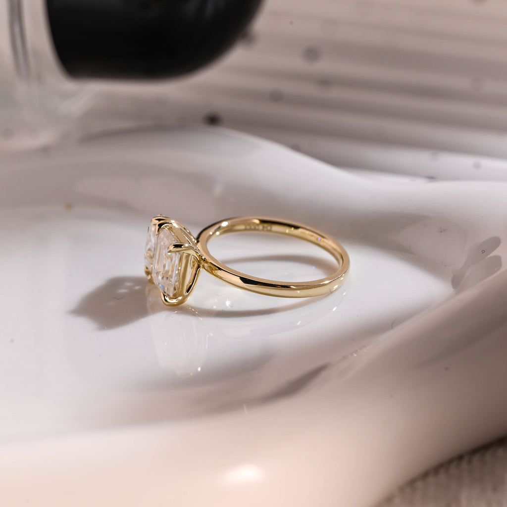 Solid Gold Toi et Moi Emerald Cut & Pear Cut Moissanite Engagement Ring