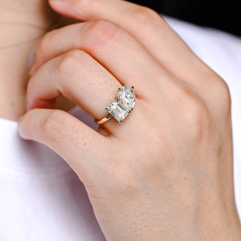 Solid Gold Toi et Moi Emerald Cut & Pear Cut Moissanite Engagement Ring