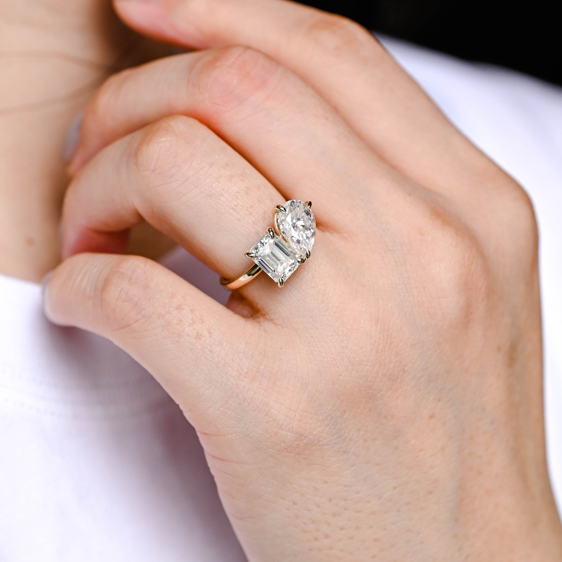 Solid Gold Toi et Moi Emerald Cut & Pear Cut Moissanite Engagement Ring