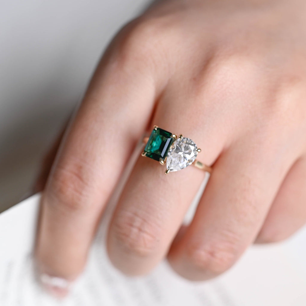 SquareJewelry emerald cut lab grown emerald engagement ring Hidden Halo Toi et Moi Lab Grown Emerald & Pear Moissanite Engagement Ring