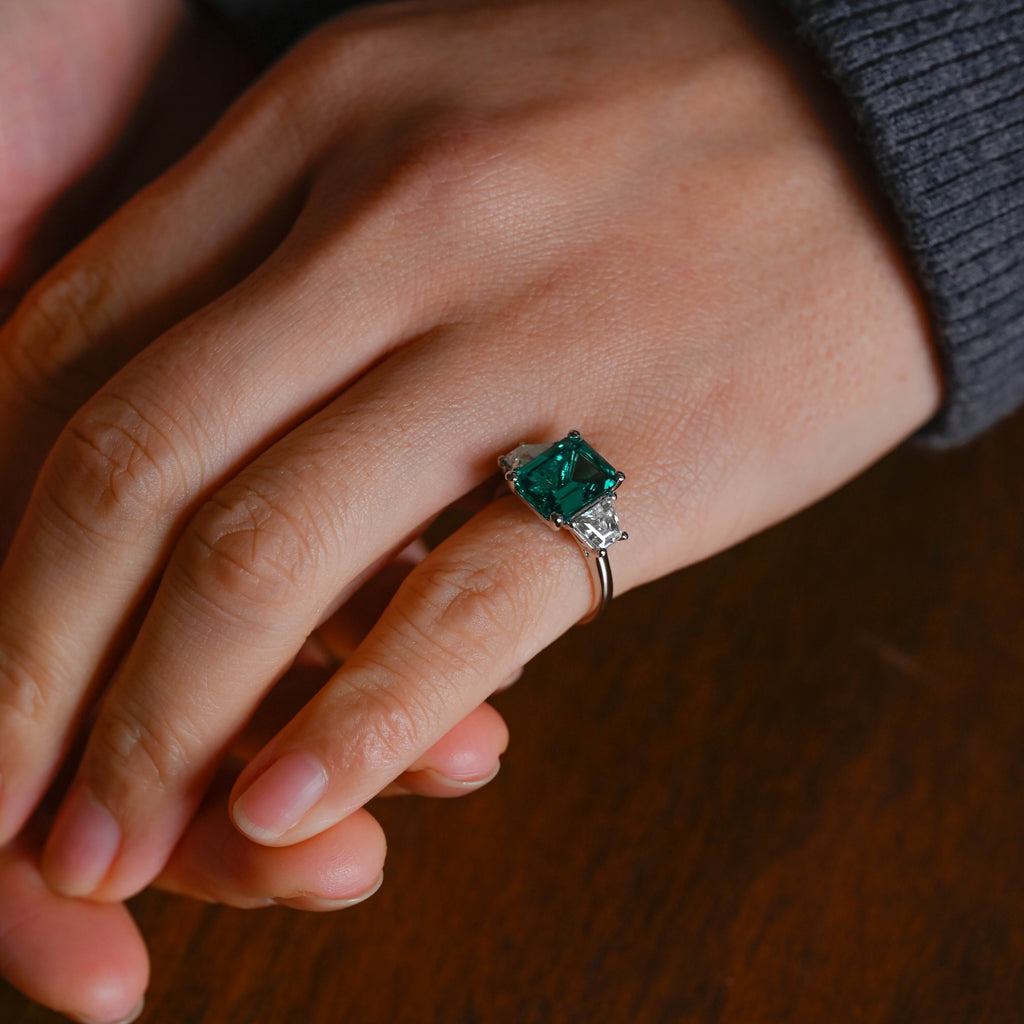 SquareJewelry emerald cut lab grown emerald engagement ring Solid Gold Three Stone Lab Grown Emerald Engagement Ring with Trapezoid Side Stone