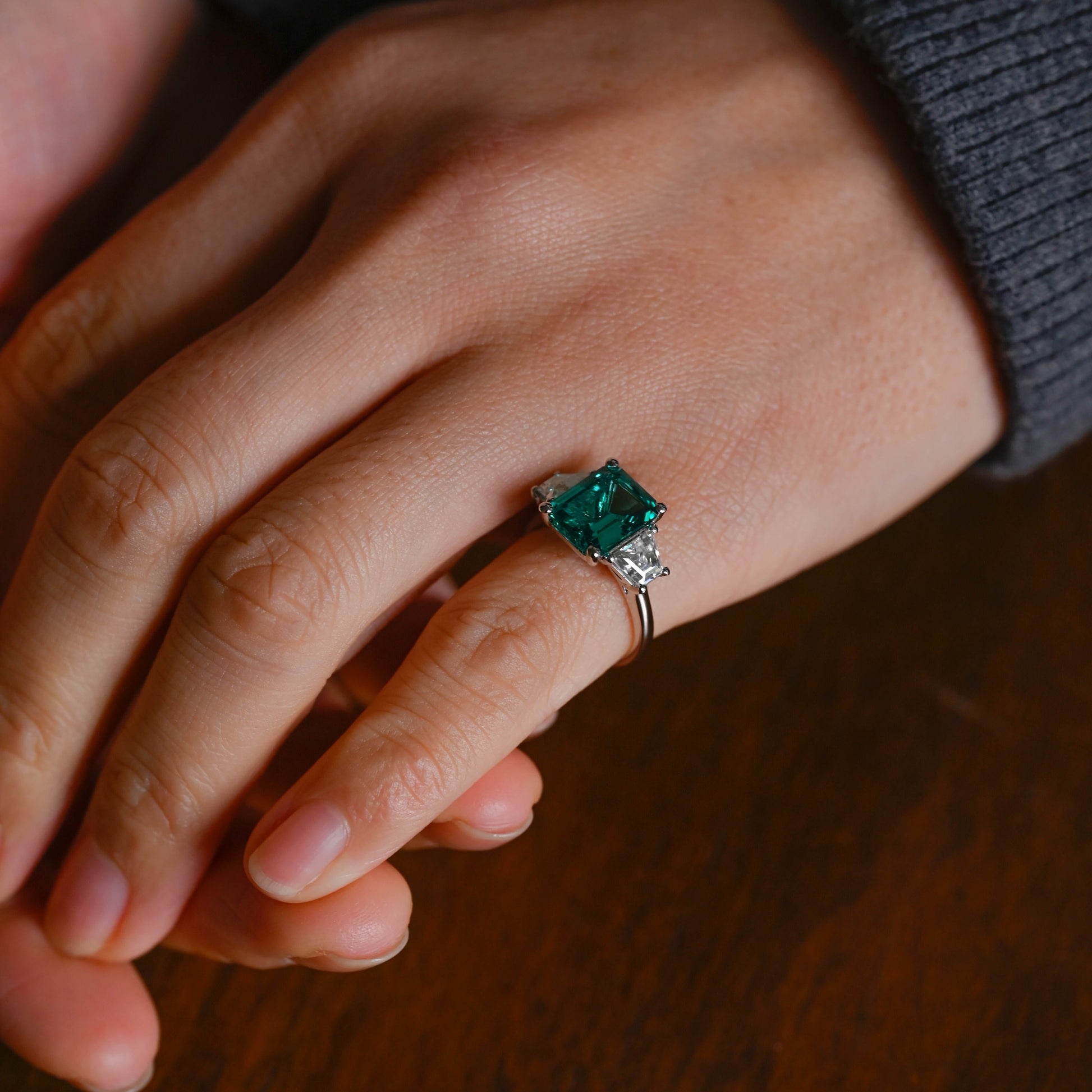 SquareJewelry emerald cut lab grown emerald engagement ring Solid Gold Three Stone Lab Grown Emerald Engagement Ring with Trapezoid Side Stone