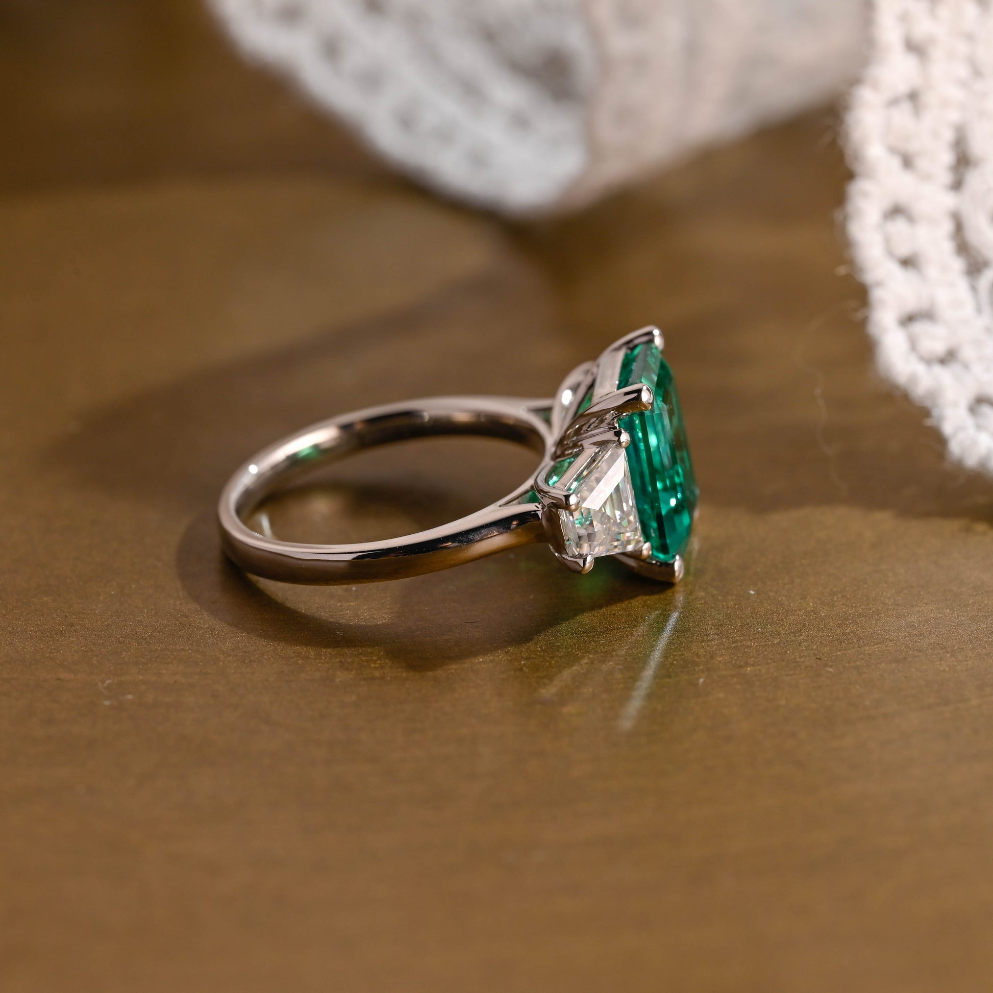 SquareJewelry emerald cut lab grown emerald engagement ring Solid Gold Three Stone Lab Grown Emerald Engagement Ring with Trapezoid Side Stone