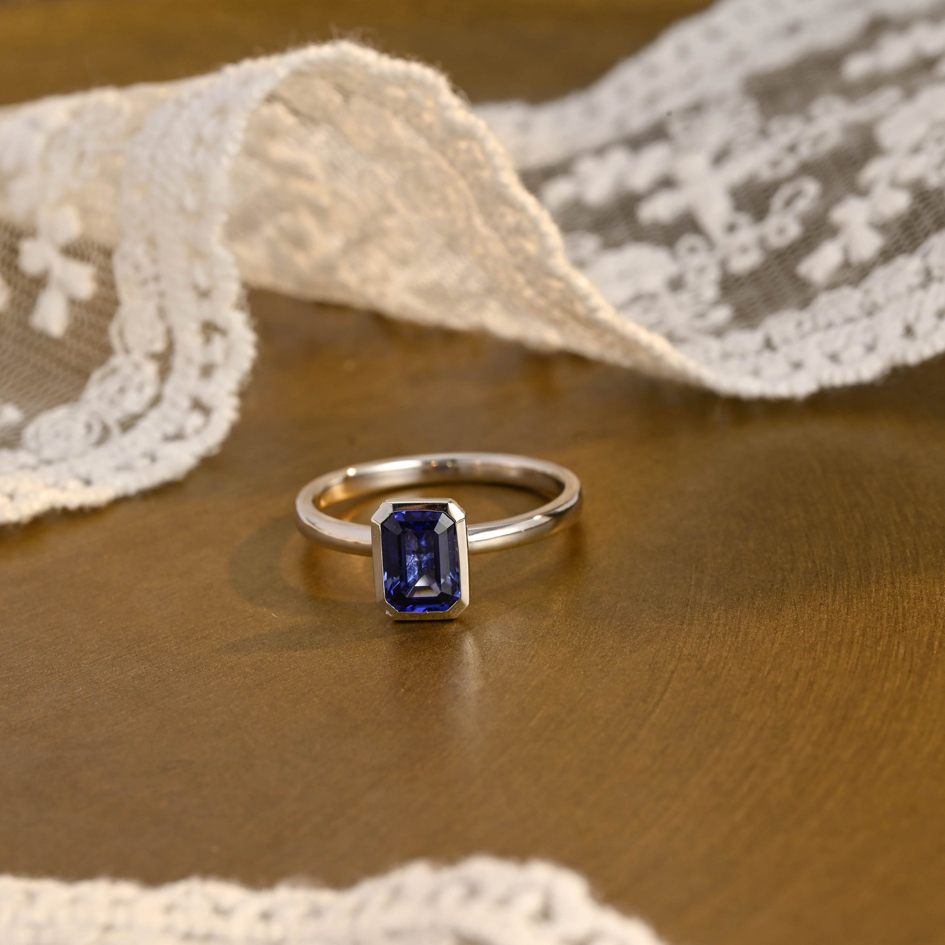 SquareJewelry emerald cut lab grown sapphire engagement ring Solid Gold Emerald Cut Lab Grown Sapphire Engagement Ring