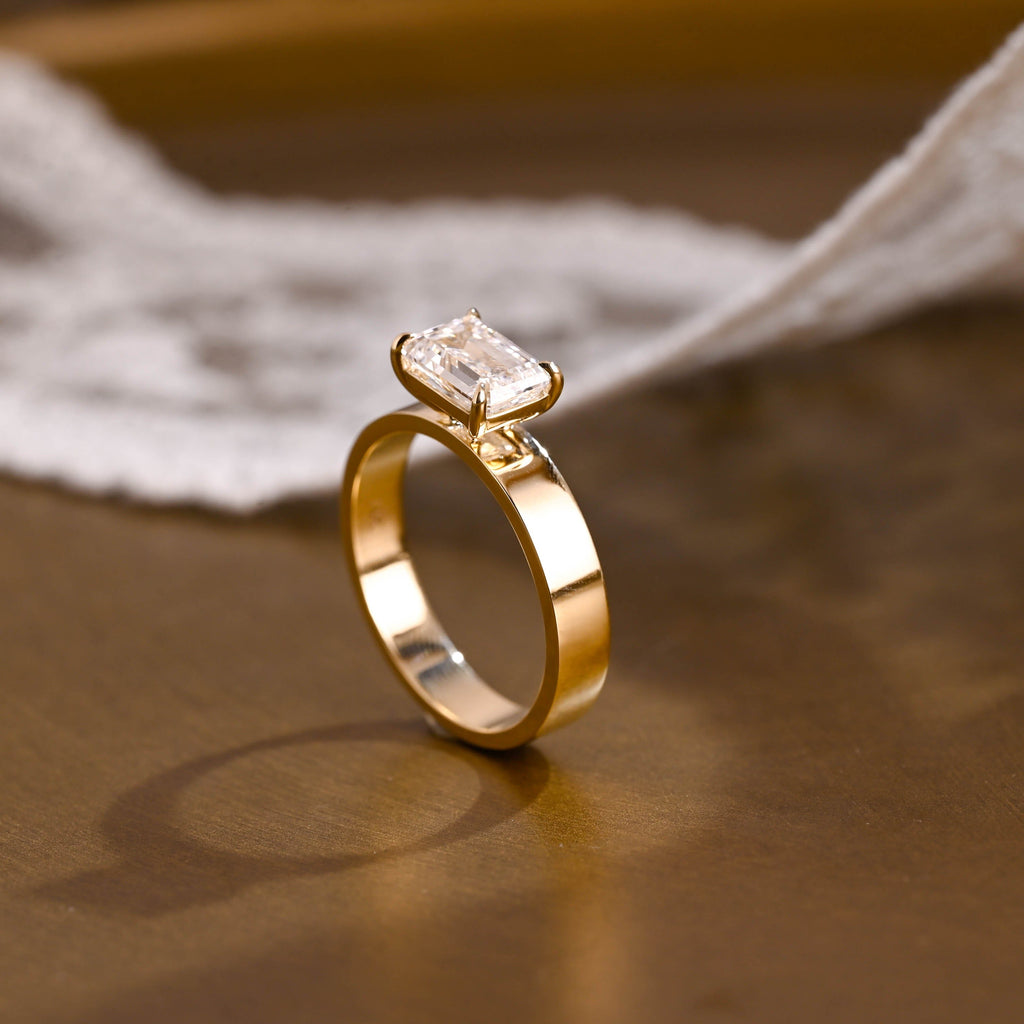 SquareJewelry emerald cut moissanite engagement ring East-West Wide Band Emerald Cut Moissanite Engagement Ring