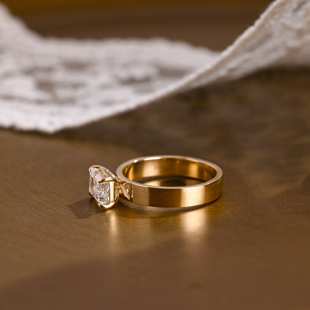 SquareJewelry emerald cut moissanite engagement ring East-West Wide Band Emerald Cut Moissanite Engagement Ring