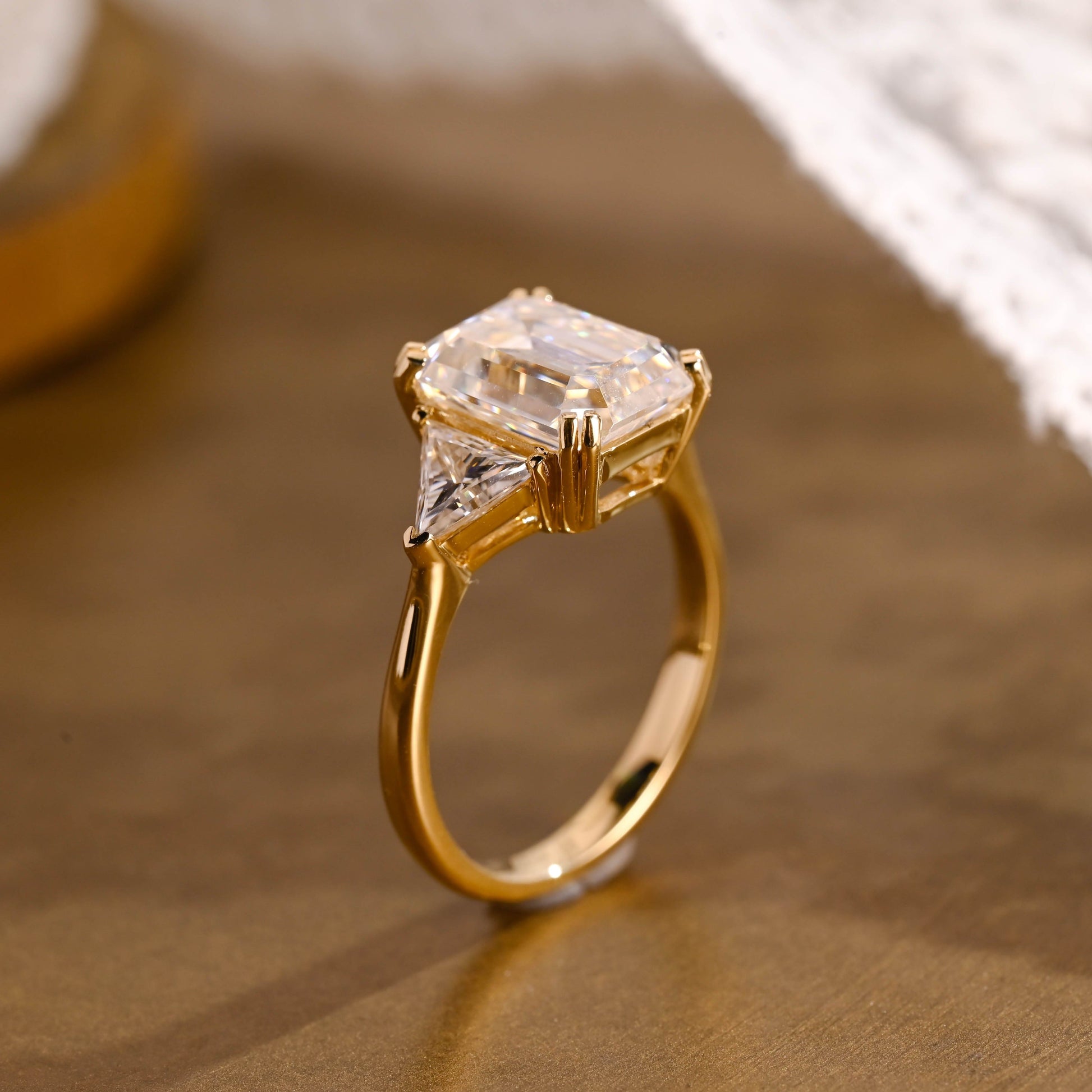 SquareJewelry emerald cut moissanite engagement ring Solid Gold Trillion Accents Emerald Cut Moissanite Engagement Ring