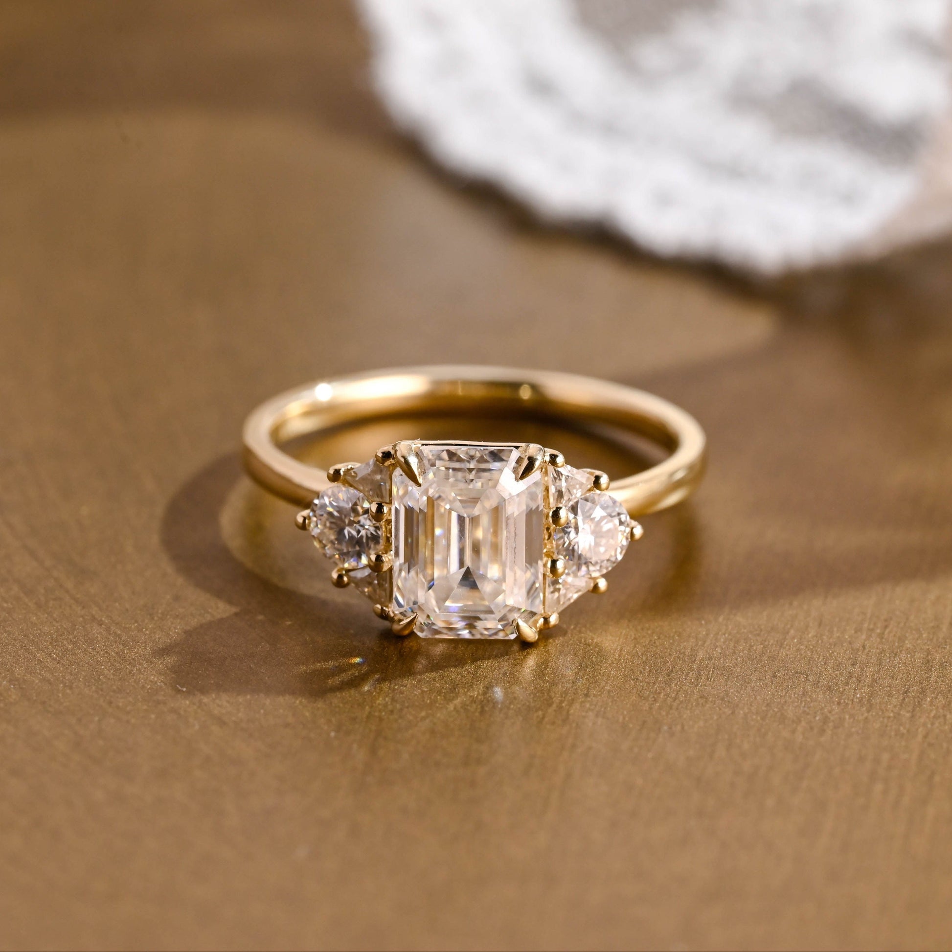 SquareJewelry emerald cut moissanite engagement ring Solid Gold Trillion & Round Side Cluster Emerald Cut Moissanite Engagement Ring