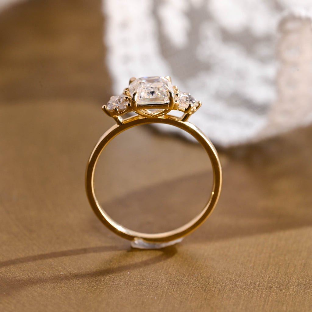 SquareJewelry emerald cut moissanite engagement ring Solid Gold Trillion & Round Side Cluster Emerald Cut Moissanite Engagement Ring