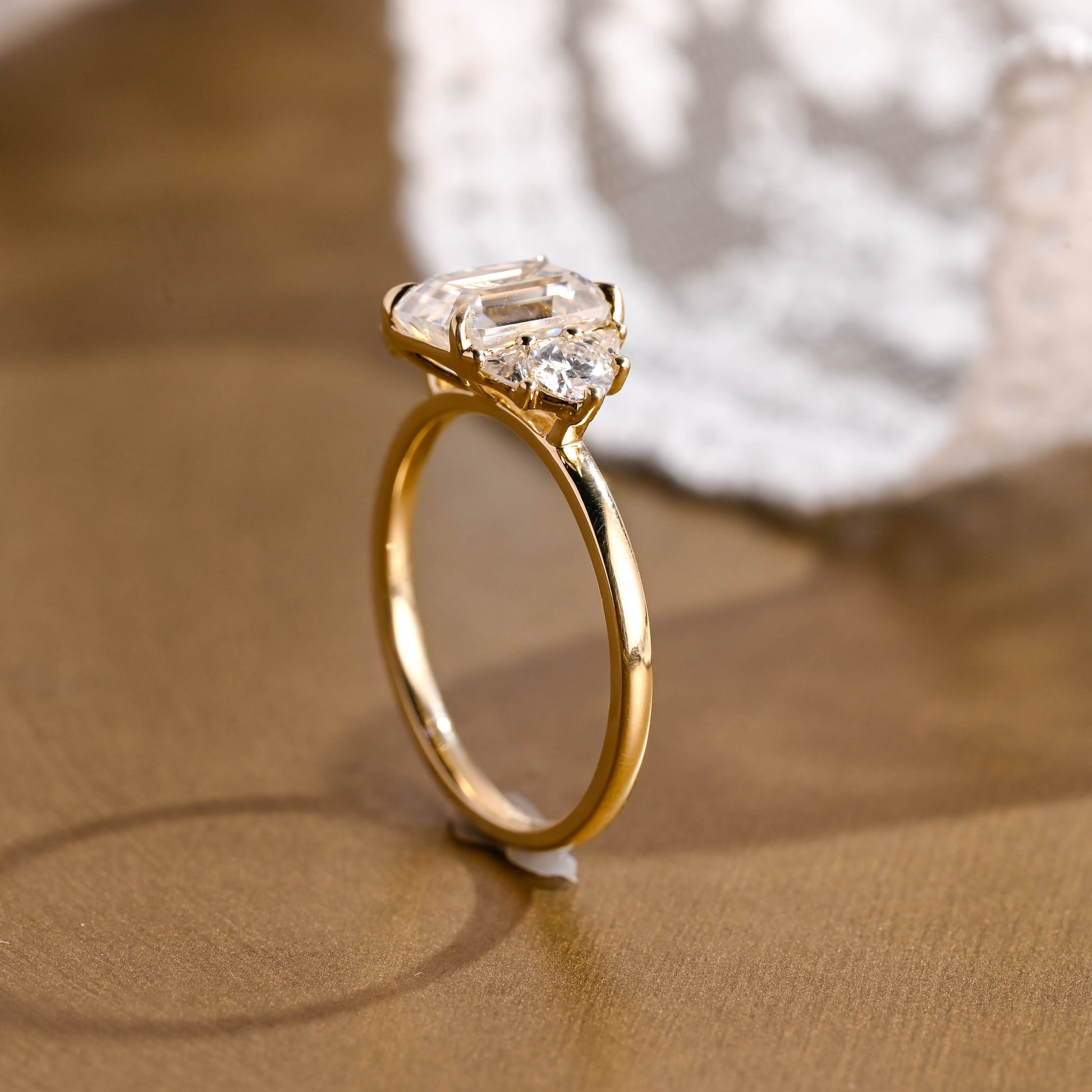 SquareJewelry emerald cut moissanite engagement ring Solid Gold Trillion & Round Side Cluster Emerald Cut Moissanite Engagement Ring