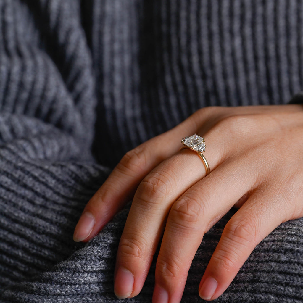 SquareJewelry emerald cut moissanite engagement ring Solid Gold Trillion & Round Side Cluster Emerald Cut Moissanite Engagement Ring