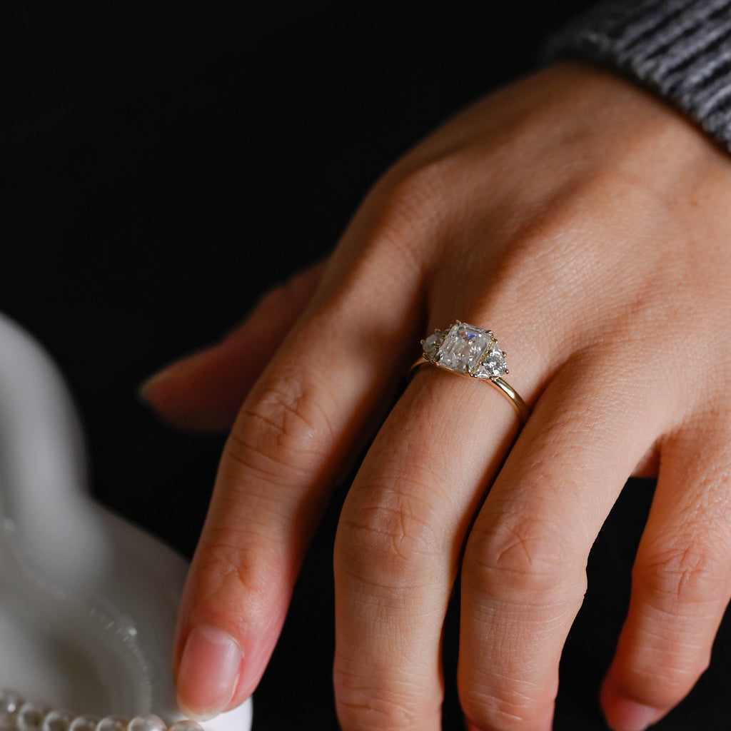 SquareJewelry emerald cut moissanite engagement ring Solid Gold Trillion & Round Side Cluster Emerald Cut Moissanite Engagement Ring