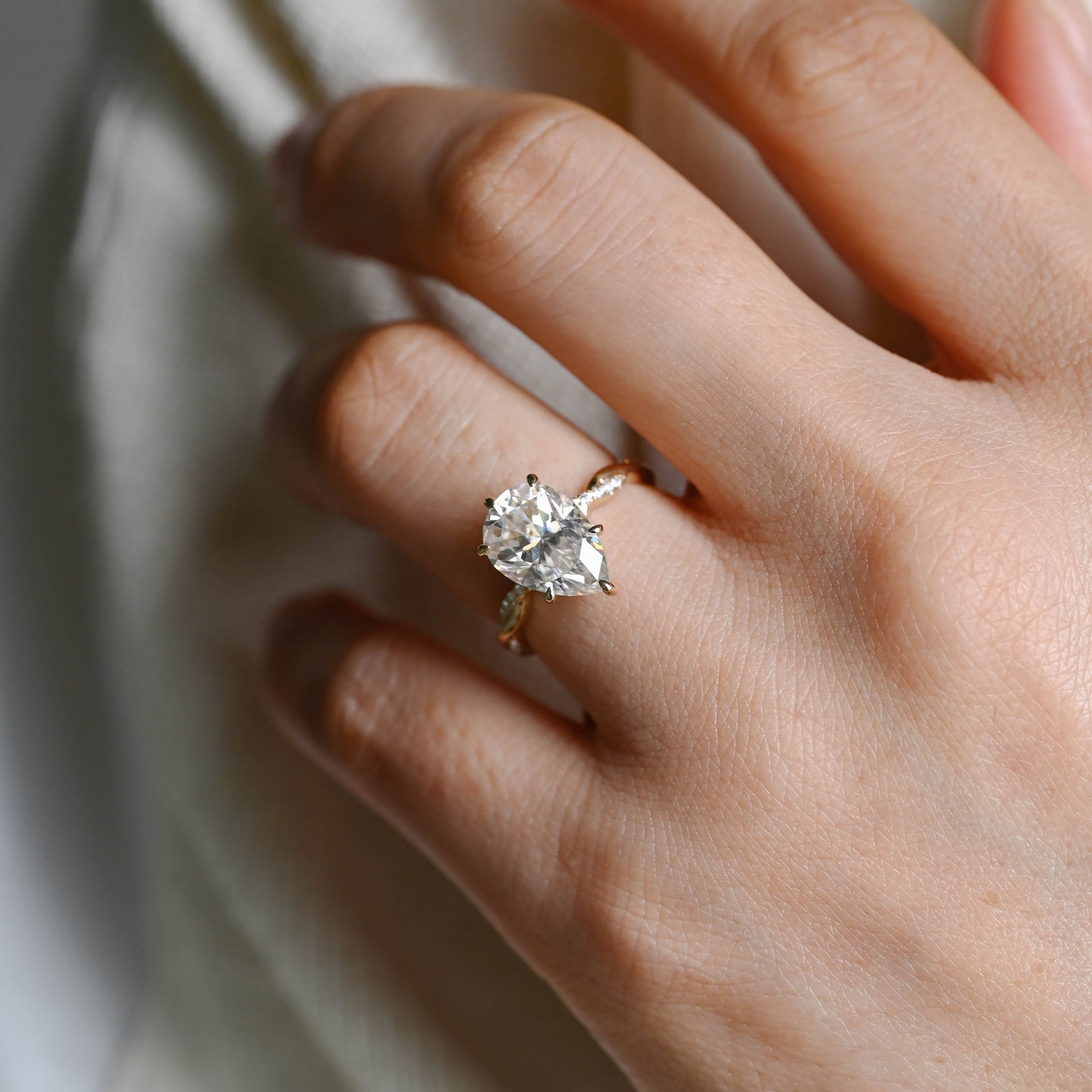 SquareJewelry pear cut moissanite engagement ring Solid Gold Hidden Halo Pear Twisted Moissanite Engagement Ring