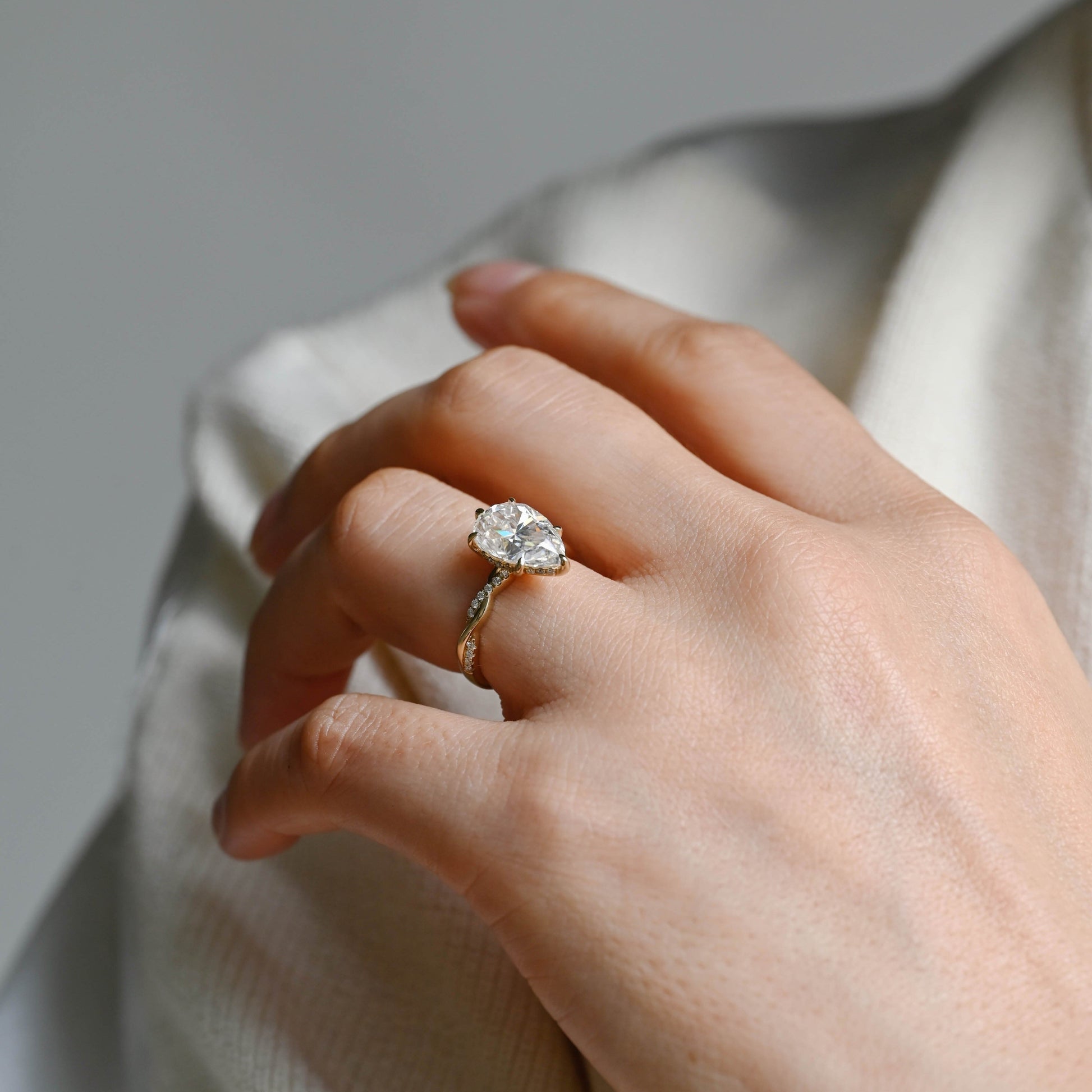 SquareJewelry pear cut moissanite engagement ring Solid Gold Hidden Halo Pear Twisted Moissanite Engagement Ring