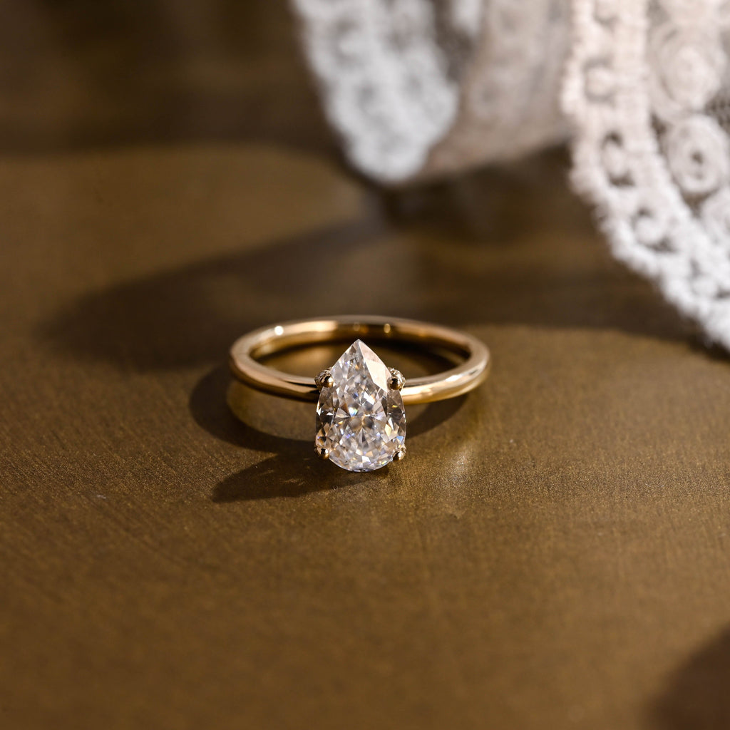 SquareJewelry pear cut moissanite engagement ring Solid Gold Paved Tulip Pear Moissanite Engagement Ring