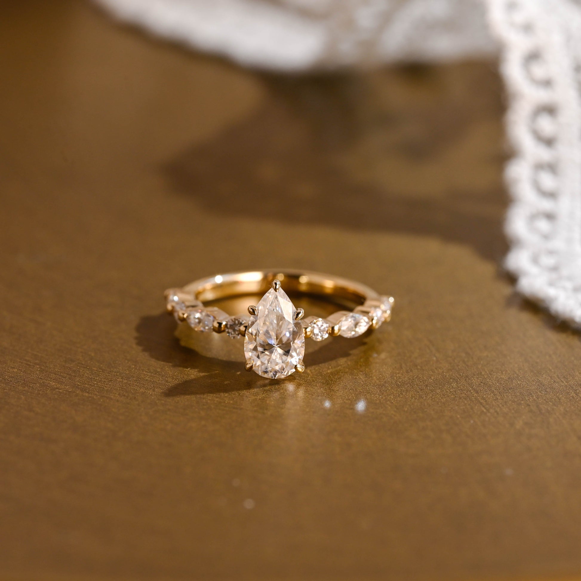 SquareJewelry pear cut moissanite engagement ring Solid Gold Pear Cut Moissanite Engagement Ring With Marquise Cut Accent