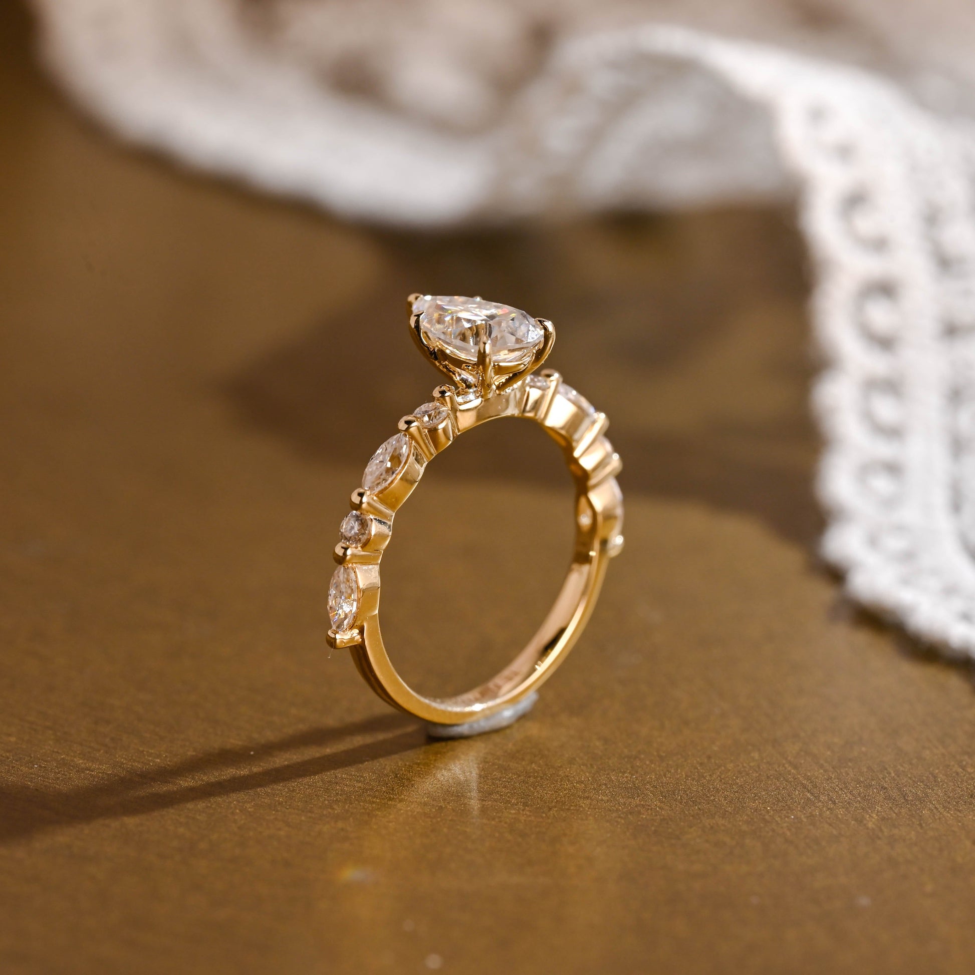 SquareJewelry pear cut moissanite engagement ring Solid Gold Pear Cut Moissanite Engagement Ring With Marquise Cut Accent