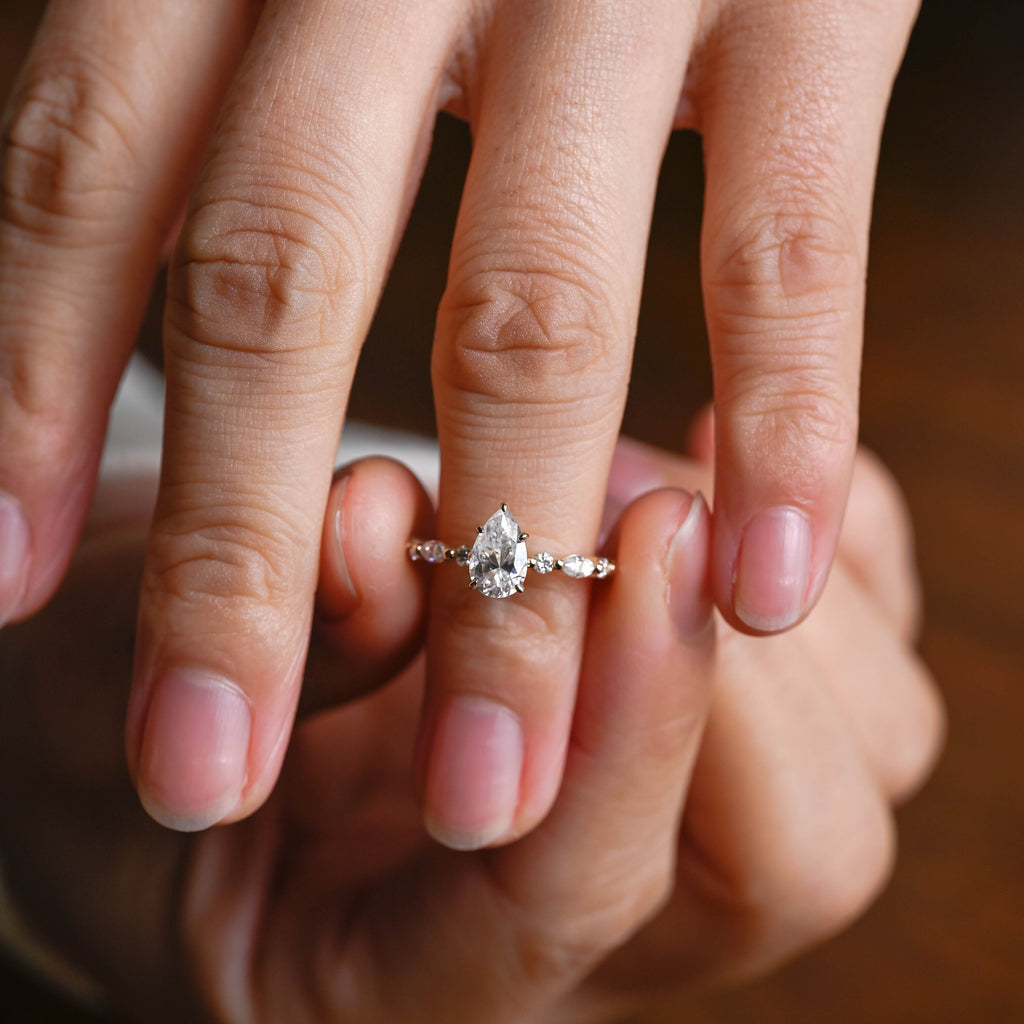 SquareJewelry pear cut moissanite engagement ring Solid Gold Pear Cut Moissanite Engagement Ring With Marquise Cut Accent