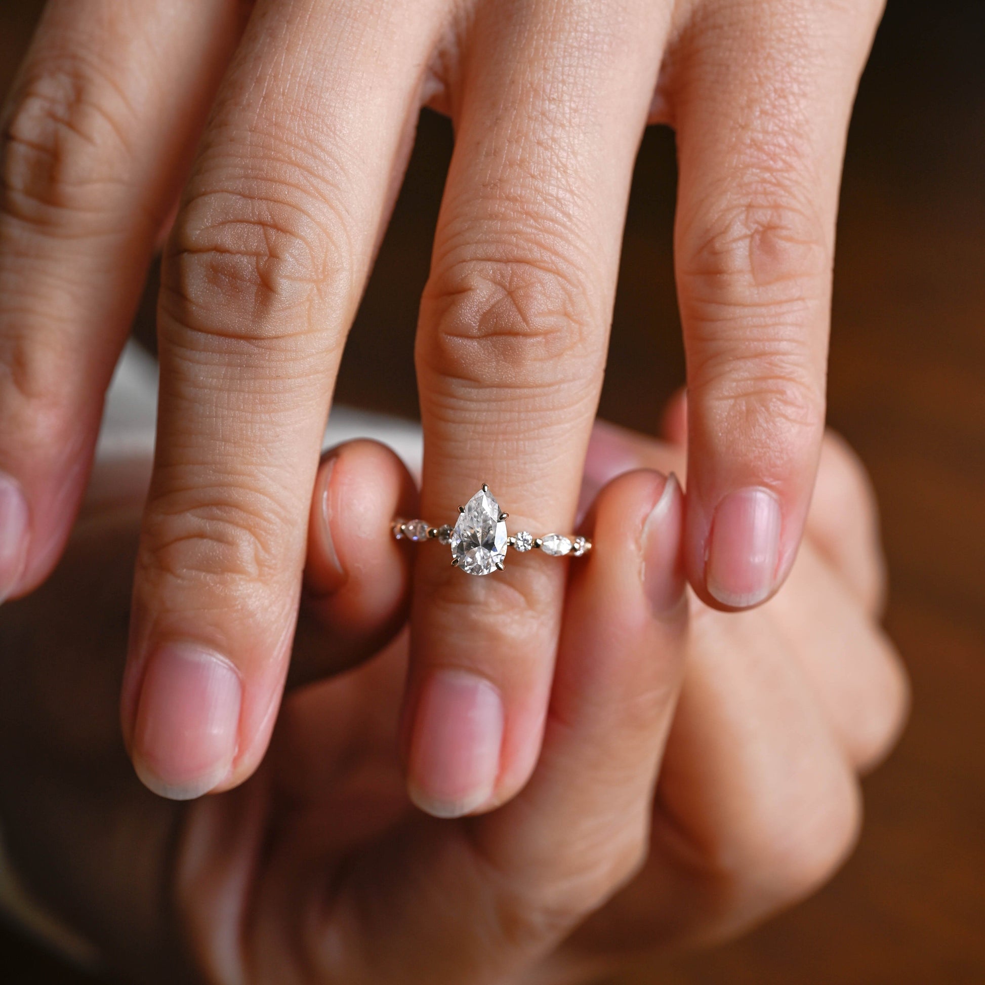 SquareJewelry pear cut moissanite engagement ring Solid Gold Pear Cut Moissanite Engagement Ring With Marquise Cut Accent
