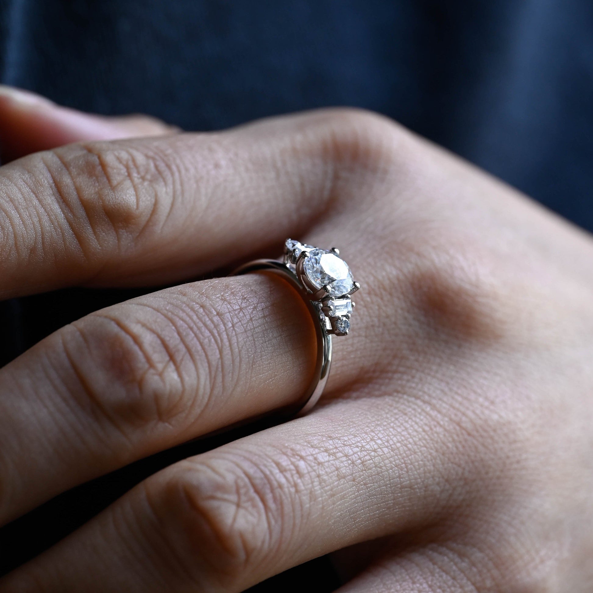 SquareJewelry round cut moissanite engagement ring Solid Gold Three Stone Round Cut Moissanite Engagement Ring with Tapered Accent Stone