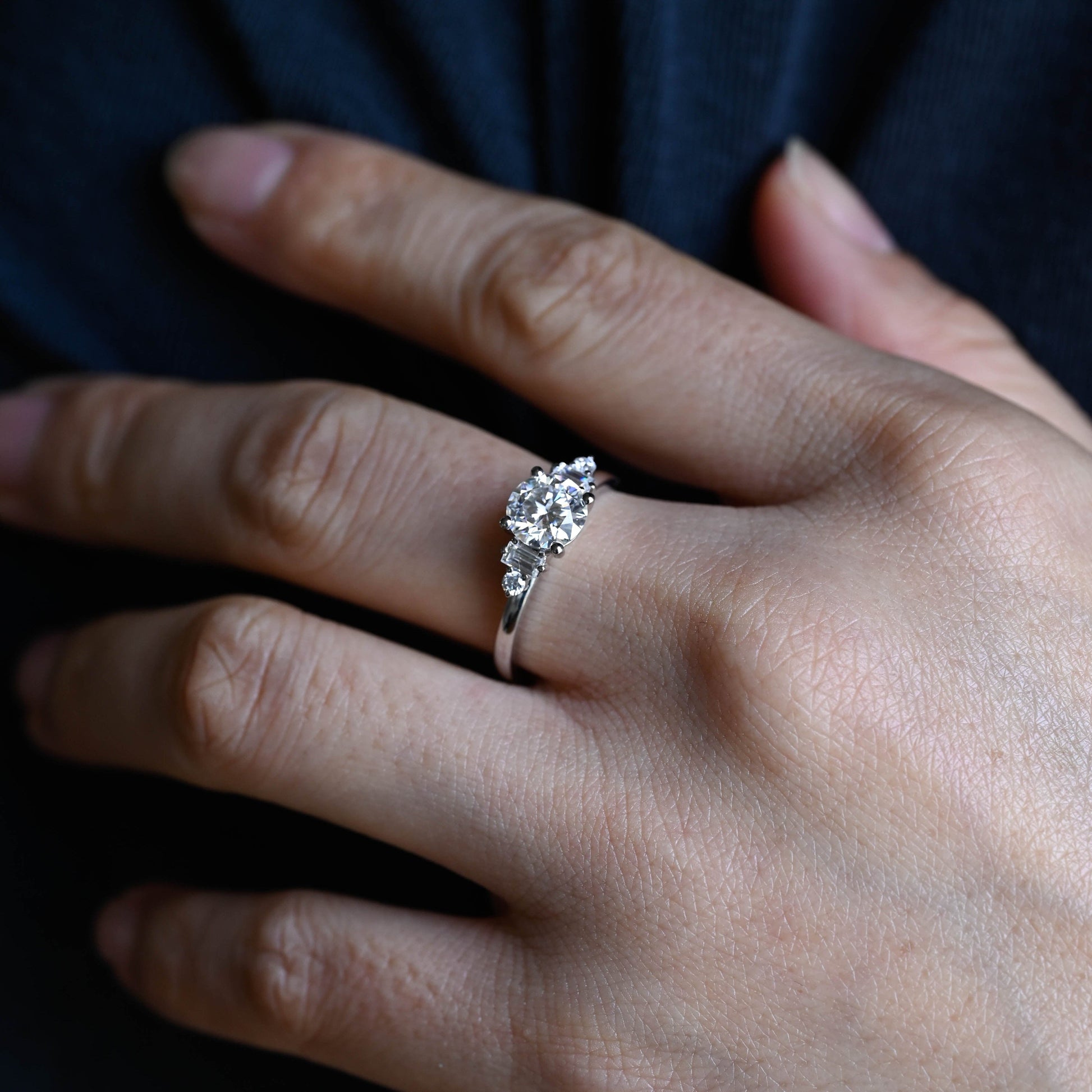 SquareJewelry round cut moissanite engagement ring Solid Gold Three Stone Round Cut Moissanite Engagement Ring with Tapered Accent Stone